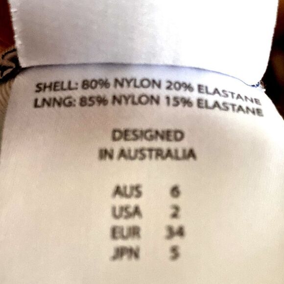 Orion Deep V Lace Up Front One Piece Swim Suit In White Navy Multi - Picture 13 of 13